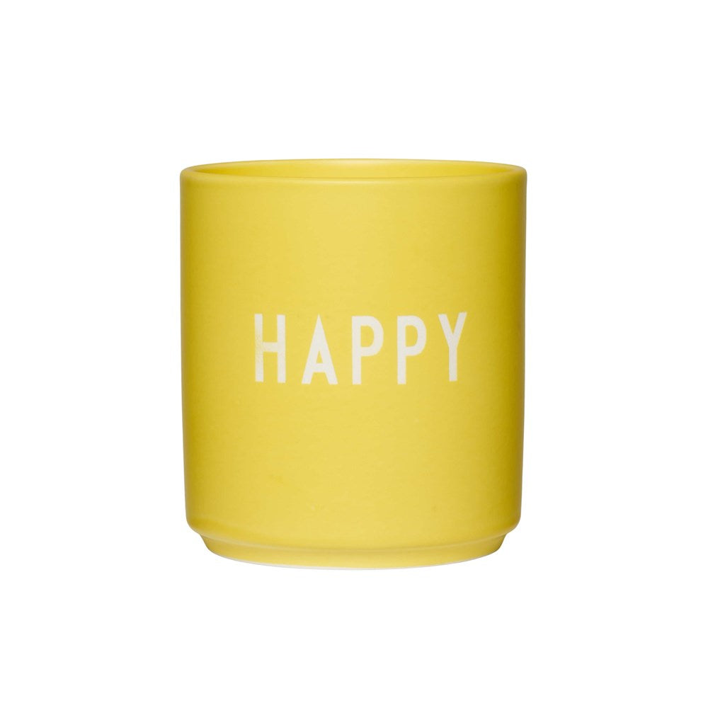 Design Letters Tasse in der Farbe yellow mit weißem Schriftzug "HAPPY"