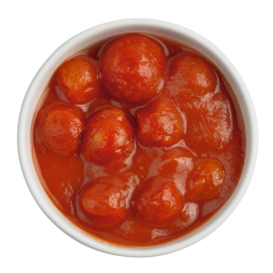 Ciliegino X Kirschtomaten, nicht geschält on oben in einer weißen Schale fotografiert