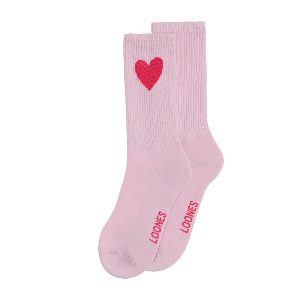 Rosa Socken mit magenta-pinkem Herz am Knöchel